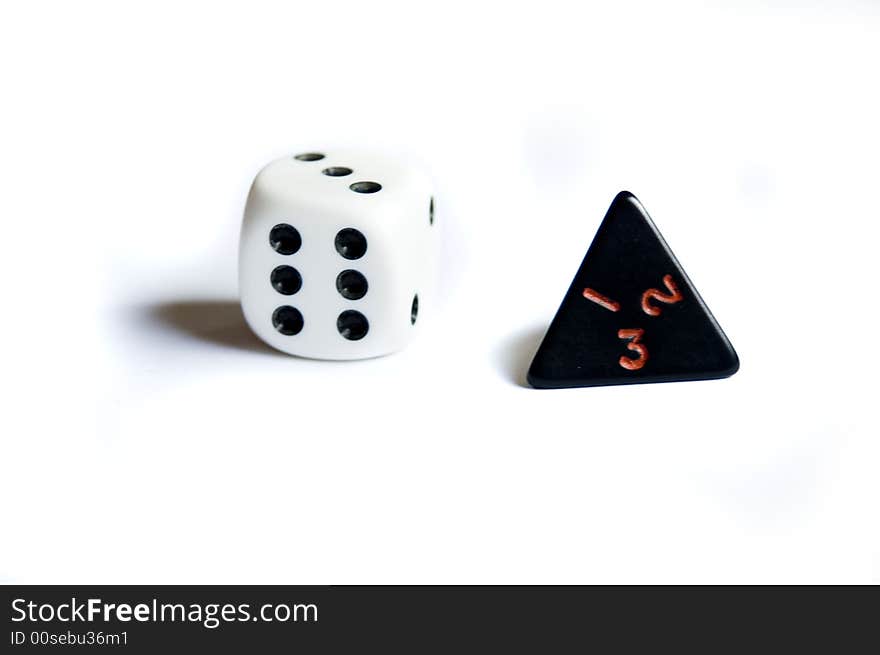 Isolated white and black dice. Isolated white and black dice