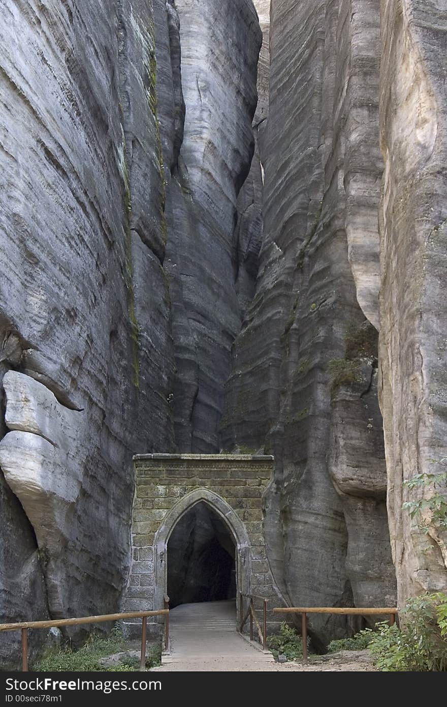 Stone gothic gate leading into the rock town called Adrspach in Czech republic. Stone gothic gate leading into the rock town called Adrspach in Czech republic