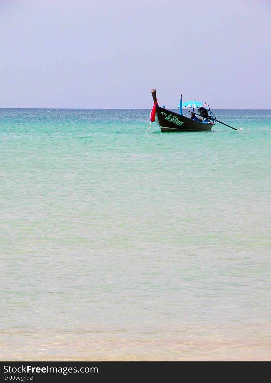 A lonely boat near Patong beach. A lonely boat near Patong beach