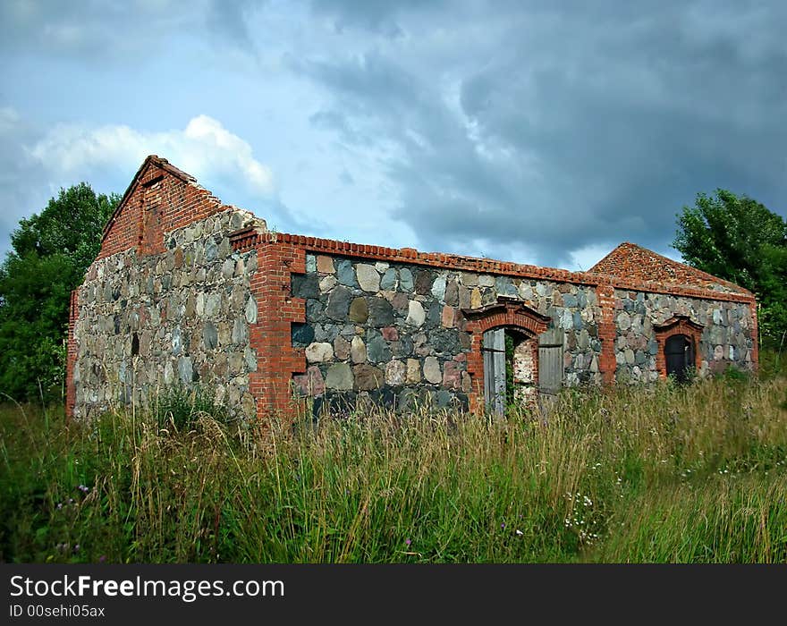 Broken house or farm without roof