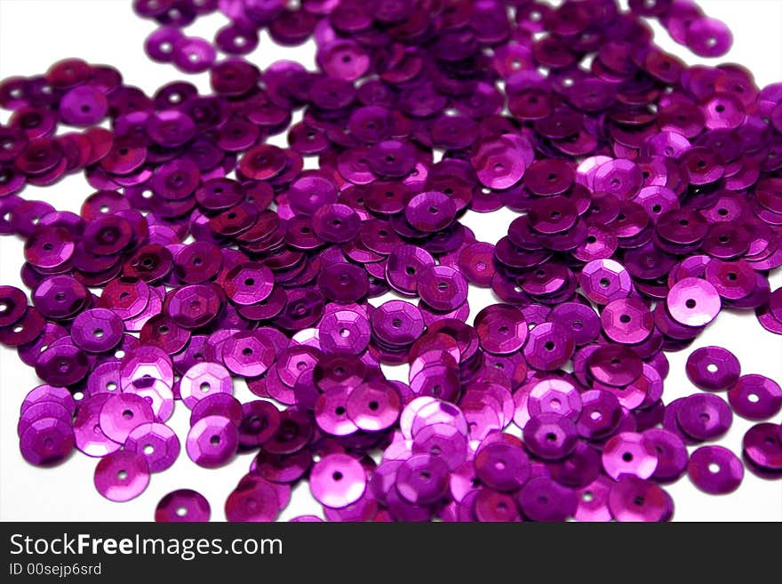 Purple confettis on the isolated background