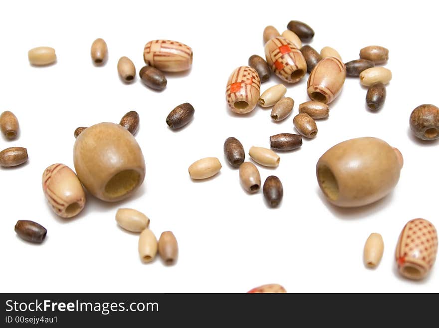 Wooden rosary on the white isolated background