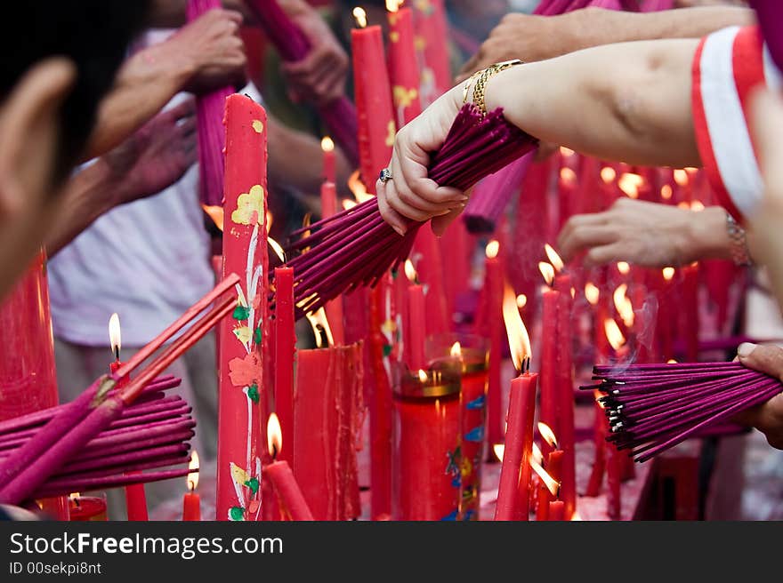 Burning incense at the temple