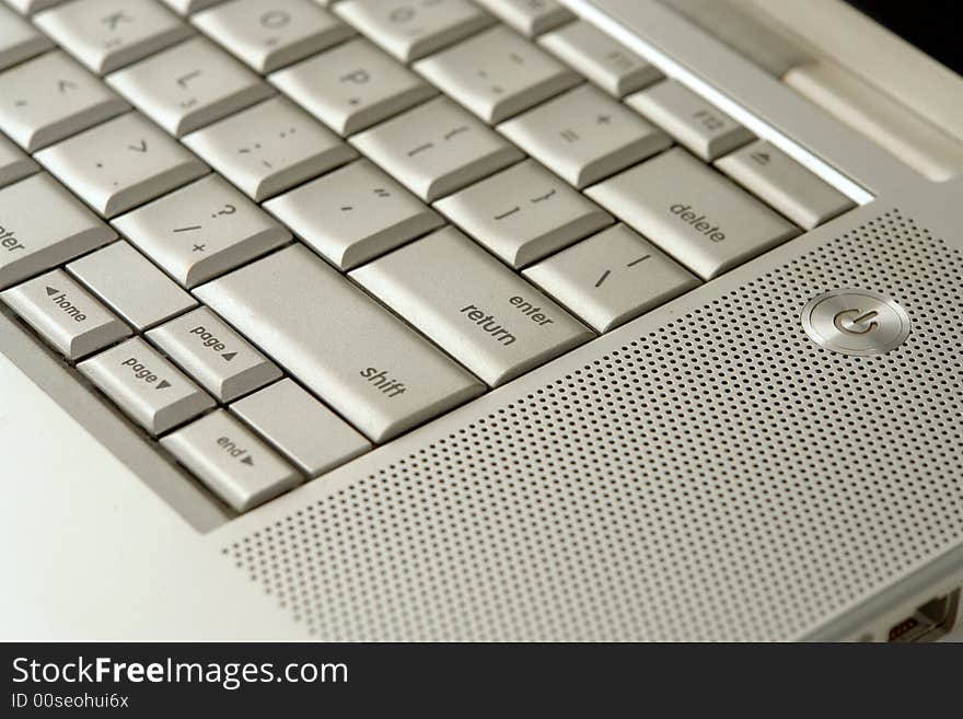 close up of hi tech silver keyboard corner