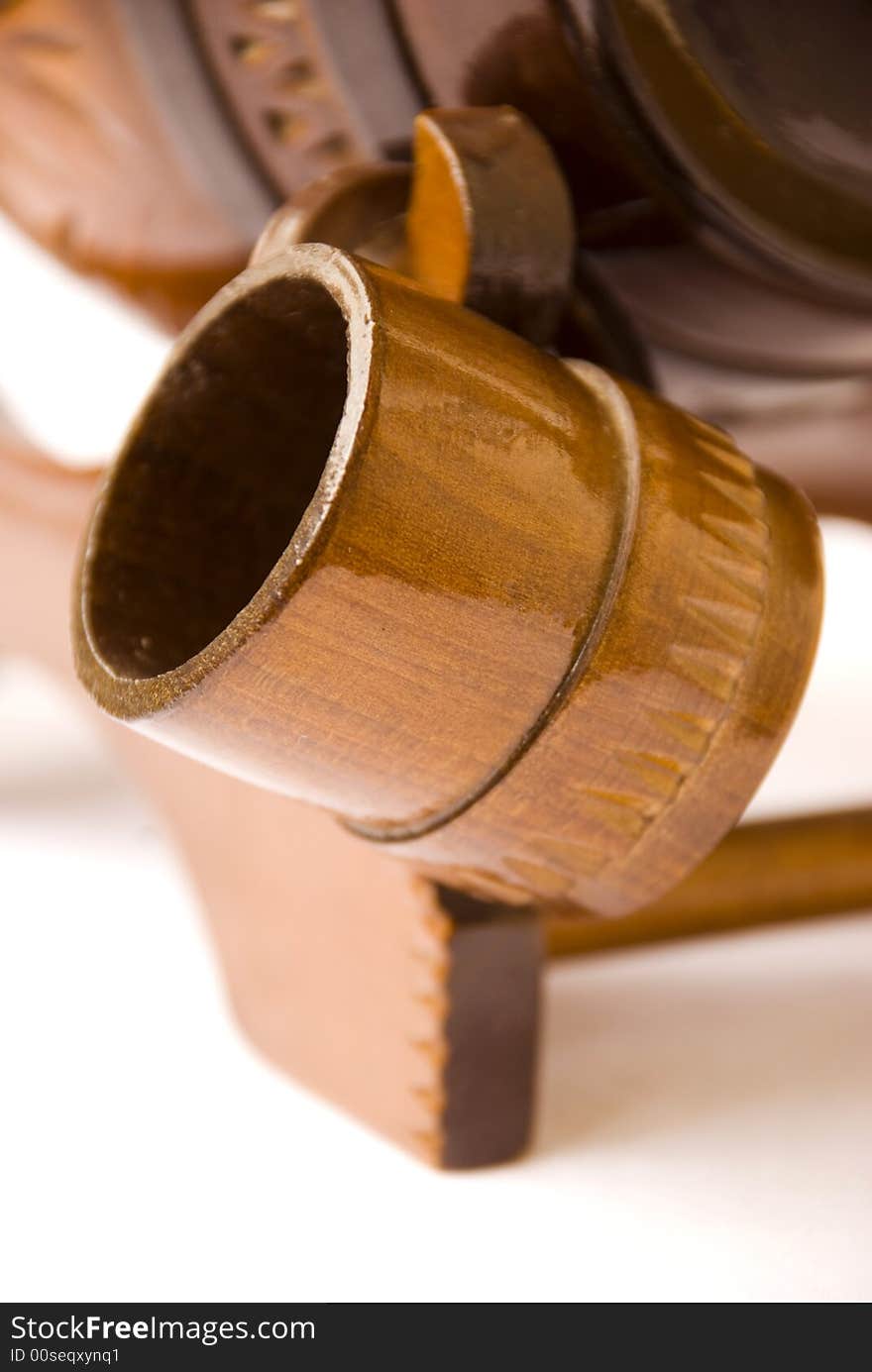 Pitcher hanging on a wine barrel