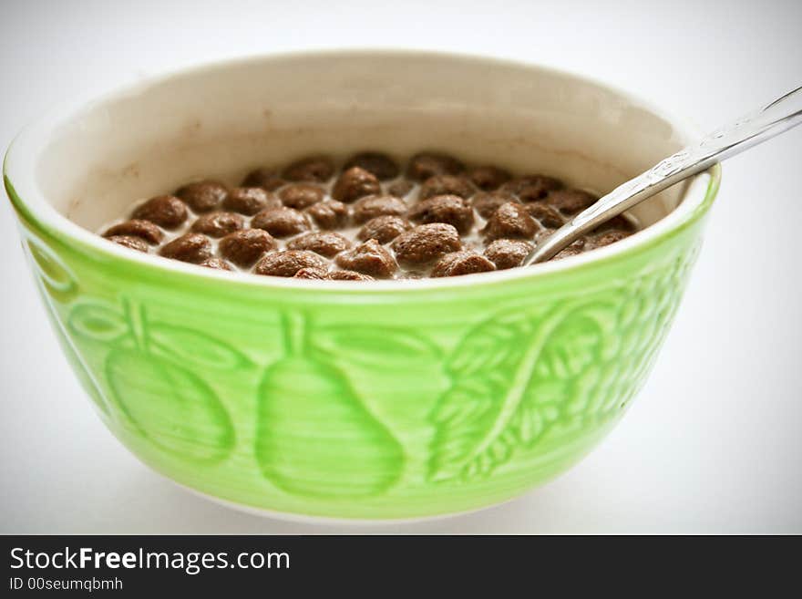 Cup of chocolate cereal isolated on white. Cup of chocolate cereal isolated on white