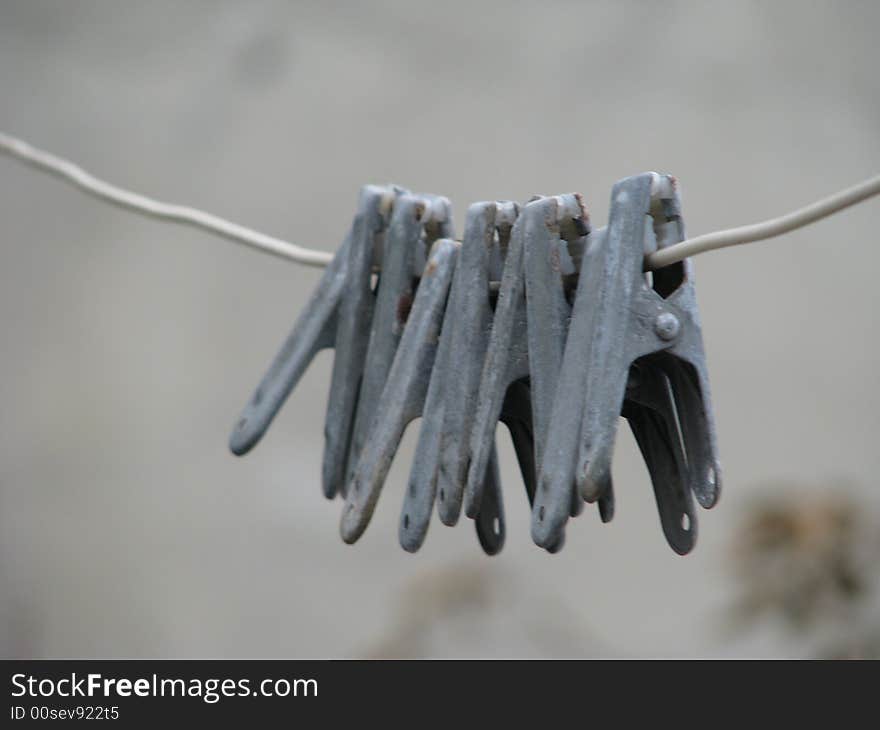 Clothespins on a cord in a court yard for drying linen