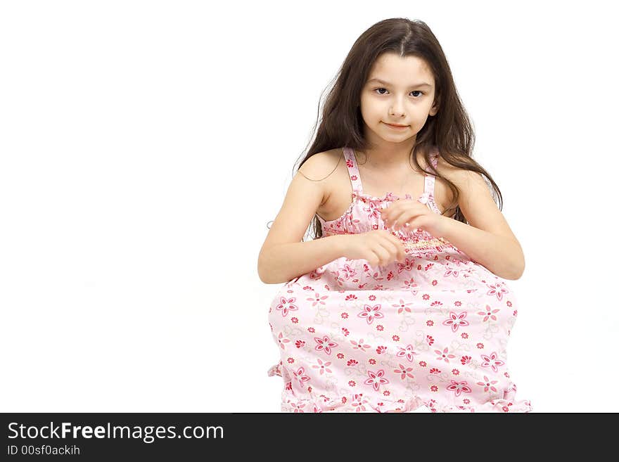 Young girl posing on a white background.