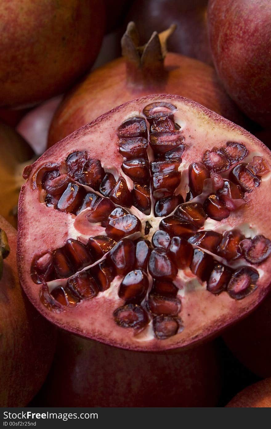 Fresh tropical fruits and juice: pomegranate