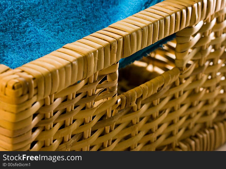 Cyan towel in a basket. Cyan towel in a basket.