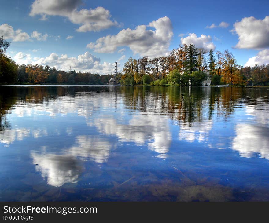 Autumn landscape with lake and trees