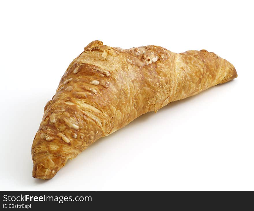 Single croissant isolated on white background