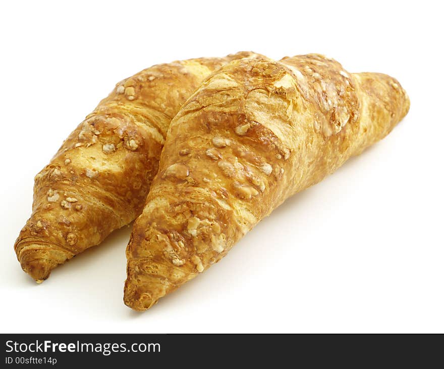 Two croissants isolated on white background