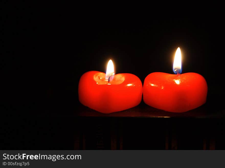 Two candles in form heart