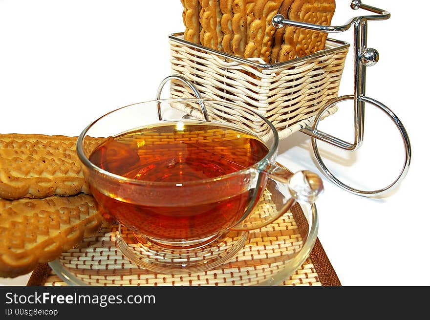 Bicycle whith cookies and a cup of tea. Bicycle whith cookies and a cup of tea