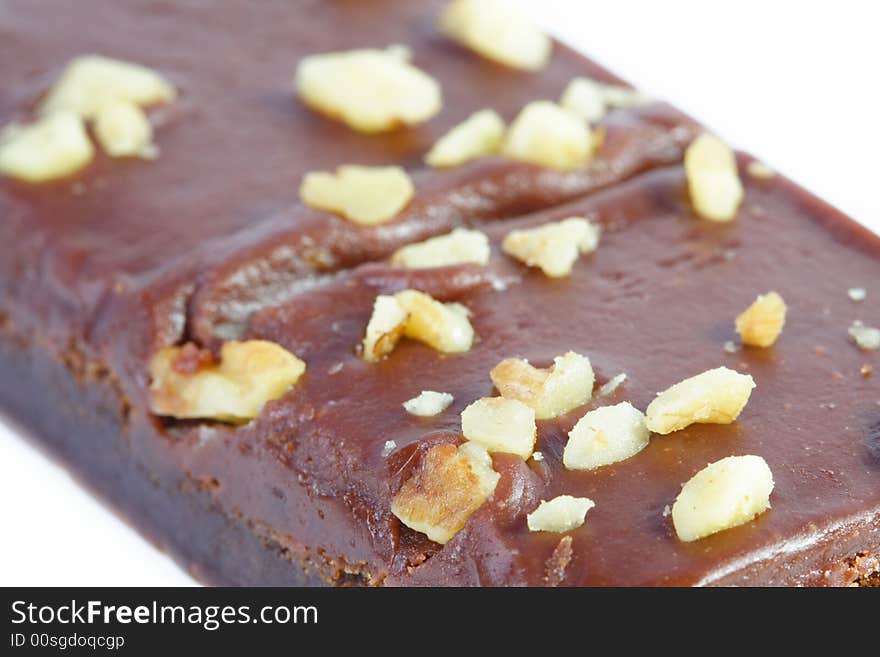 Brownie with nuts on top.