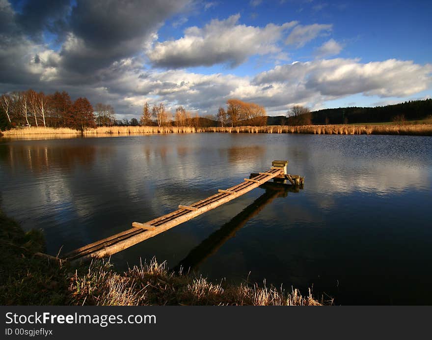 Trre in meadow,about the pond,cross wind,cloud rock,arboor,foters,cloud drift,heap,countryside,