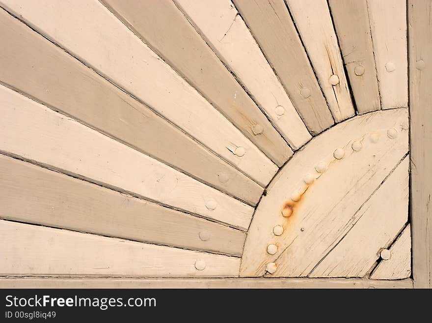 Closeup of sun shape on old woodern door found on a Bavarian farm. Closeup of sun shape on old woodern door found on a Bavarian farm.