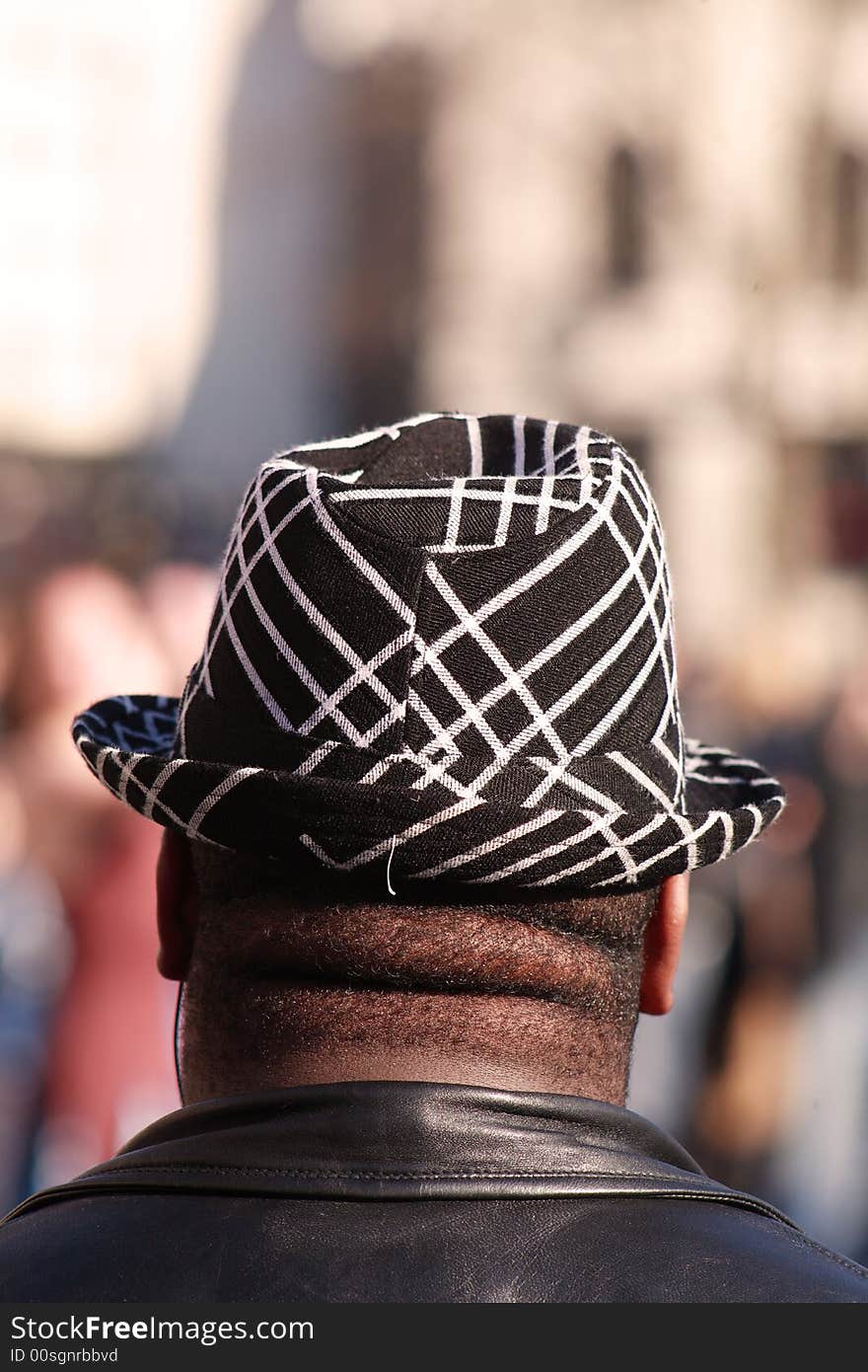 Man in black and white hat london. Man in black and white hat london