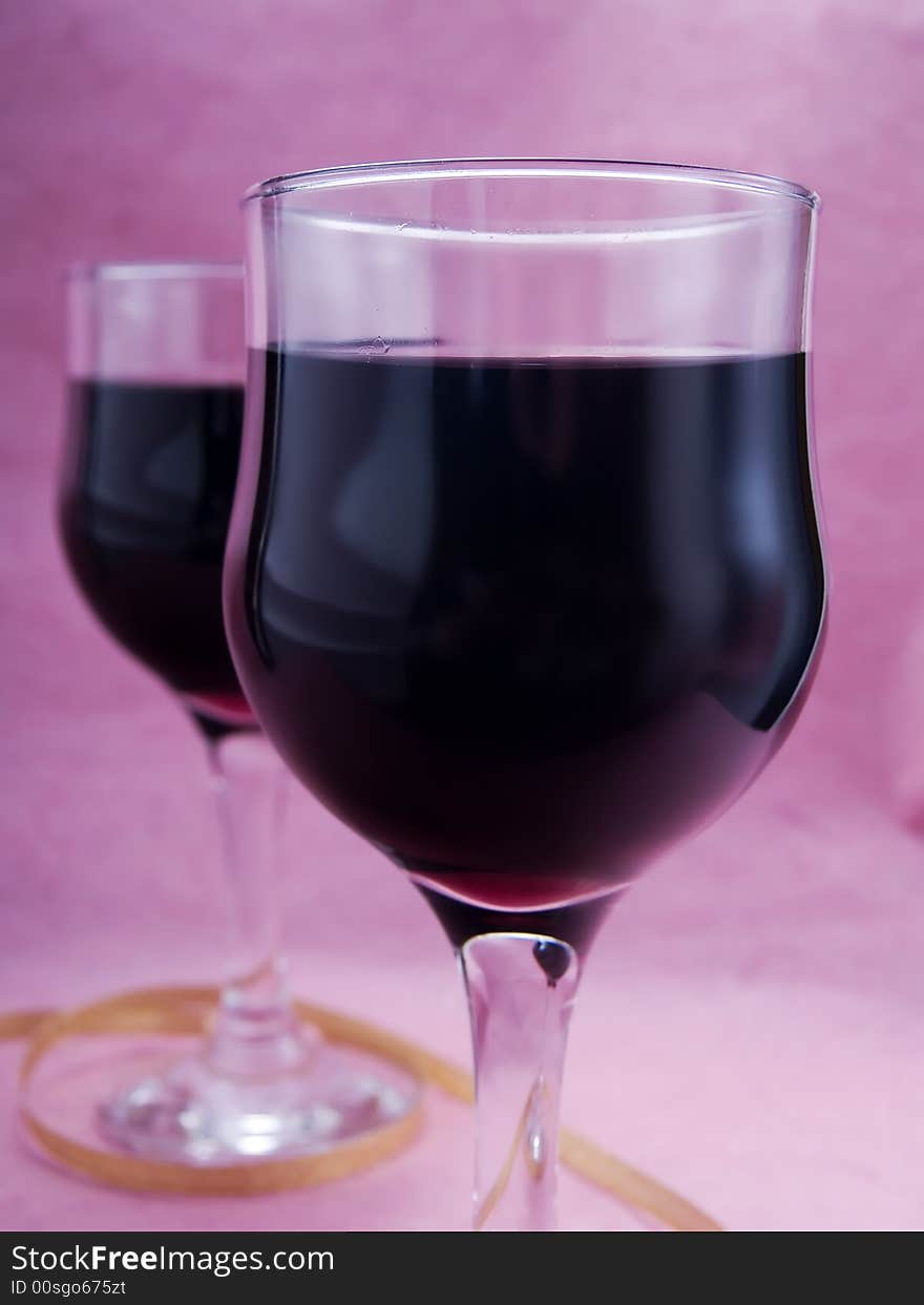 Two glasses of red wine. Two glasses of red wine