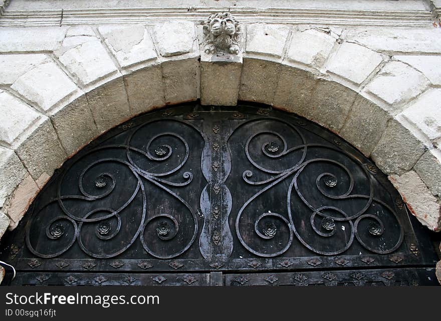 Old gate with a stone arch