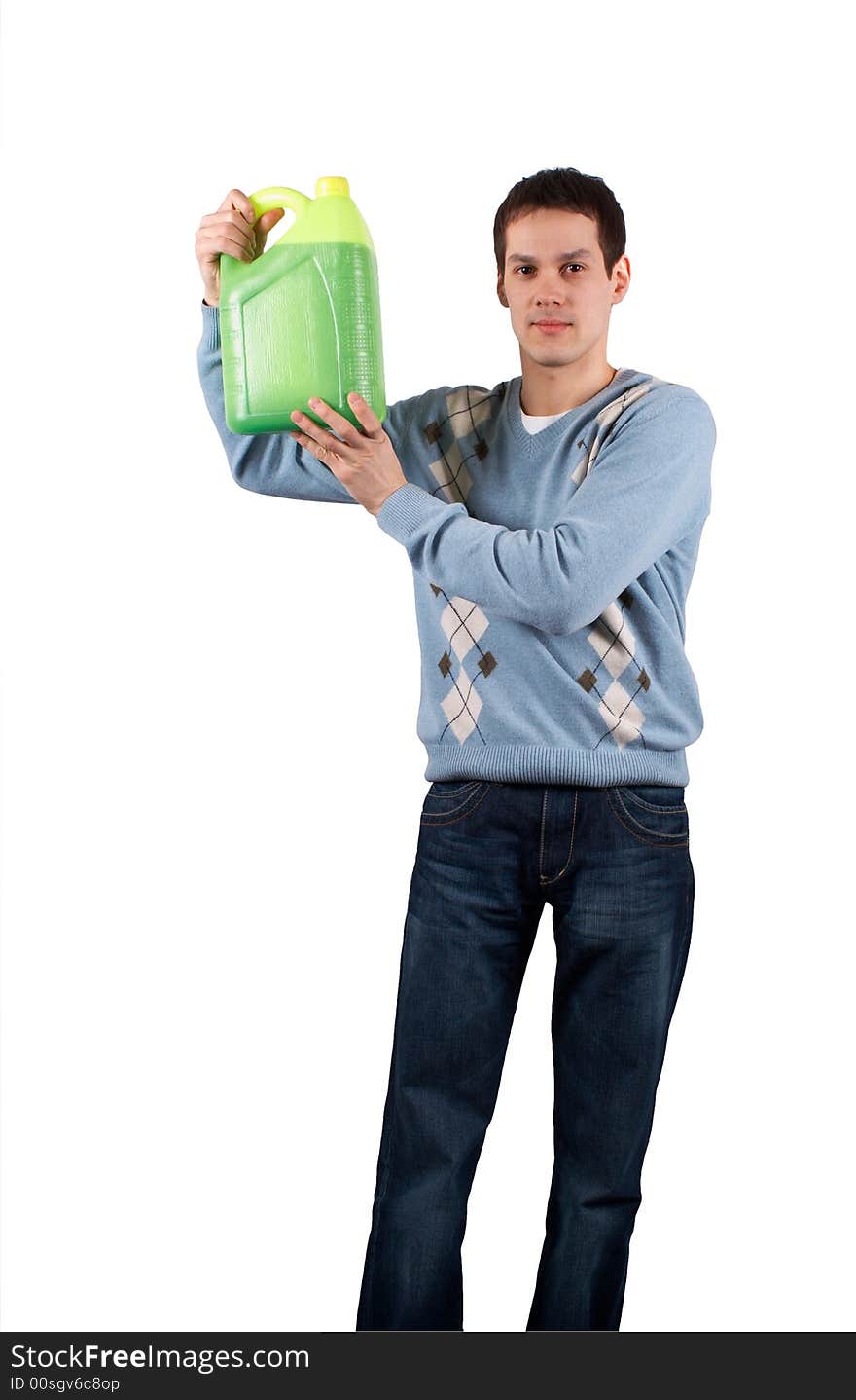 Young man with green jerrican isolated on white