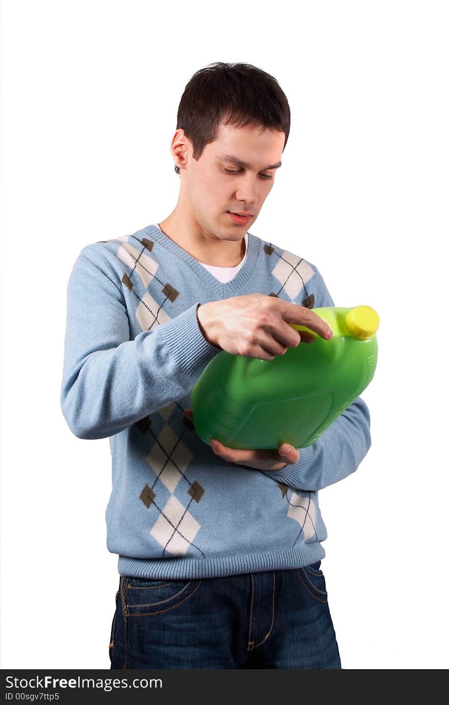 Young man with green jerrican isolated on white 2. Young man with green jerrican isolated on white 2