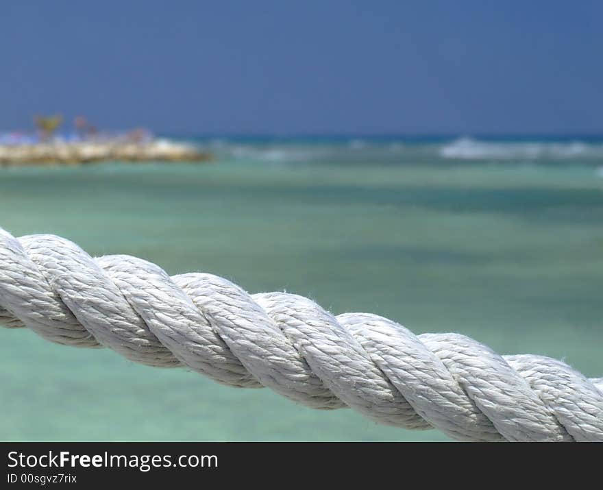 Rope Fence On Tropical Beach