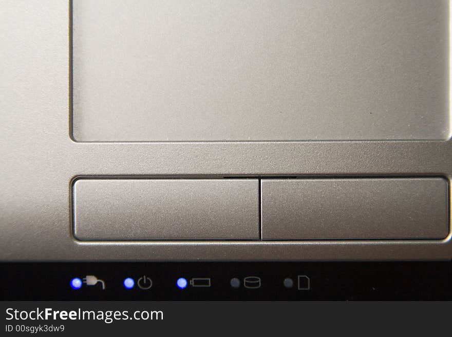 The touch pad of silvery color, is close located