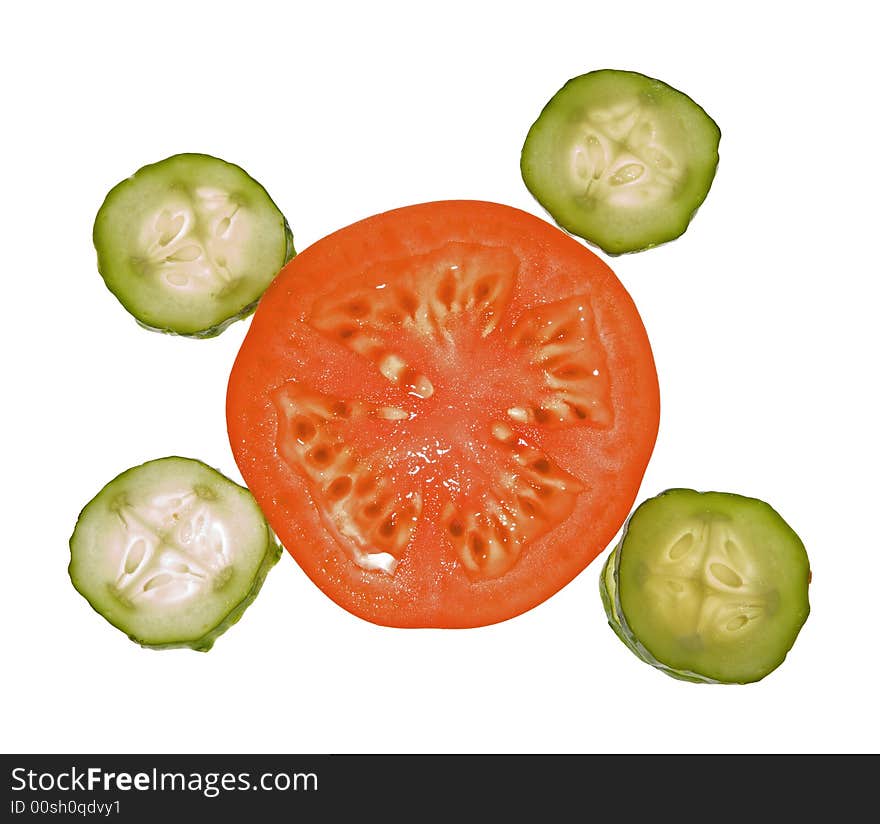 Slices of tomato and cucumber, isolated on white