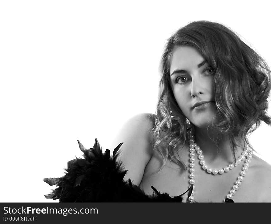 Retro-styled girl with beads and boa in black-and-white