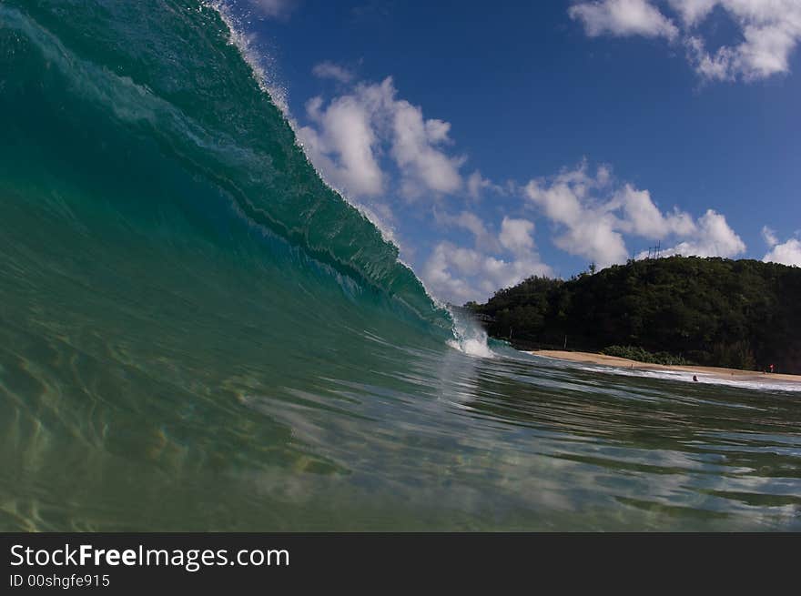 Giant wave breaking on the north shore of oahu. Giant wave breaking on the north shore of oahu