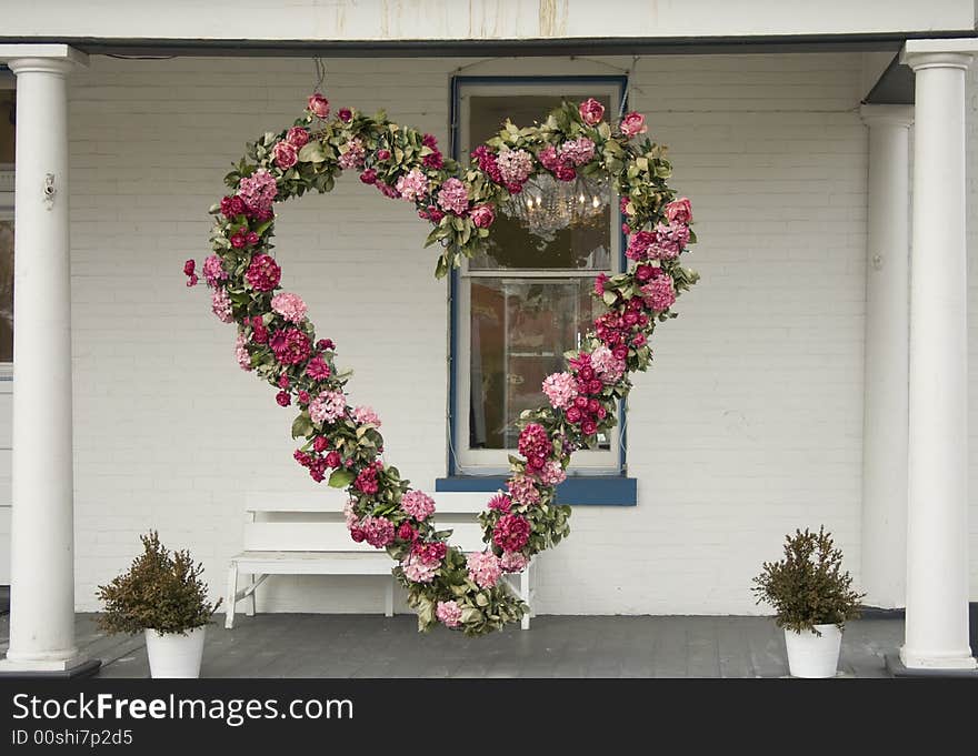 A wreath of flowers in the shape of a heart. Perfect for Valentine's Day. A wreath of flowers in the shape of a heart. Perfect for Valentine's Day.