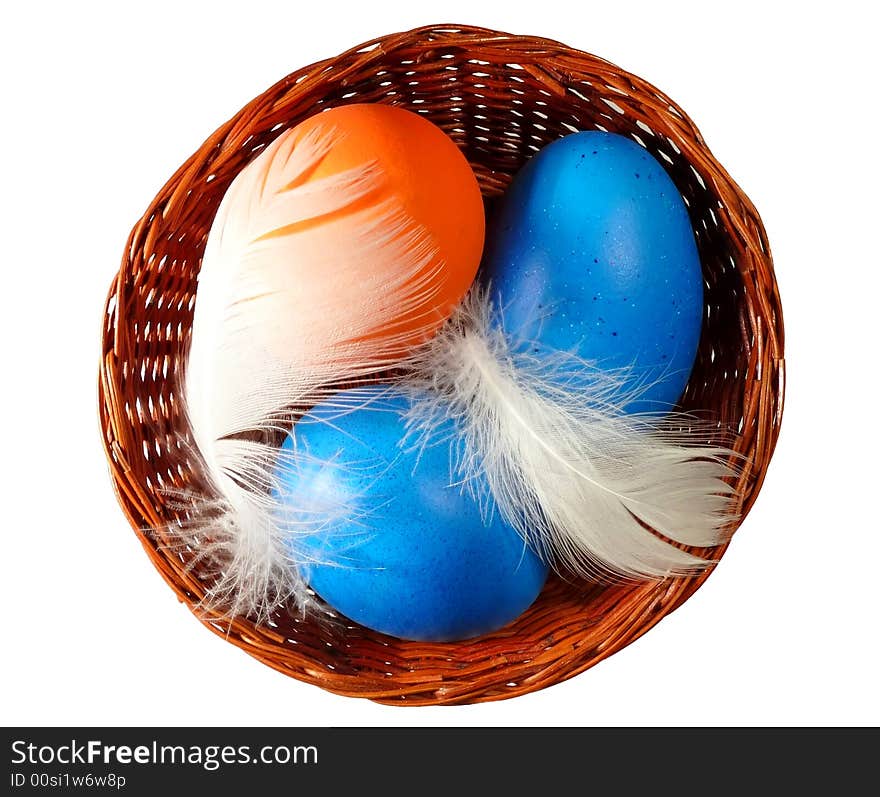 Easter eggs on wicker basket