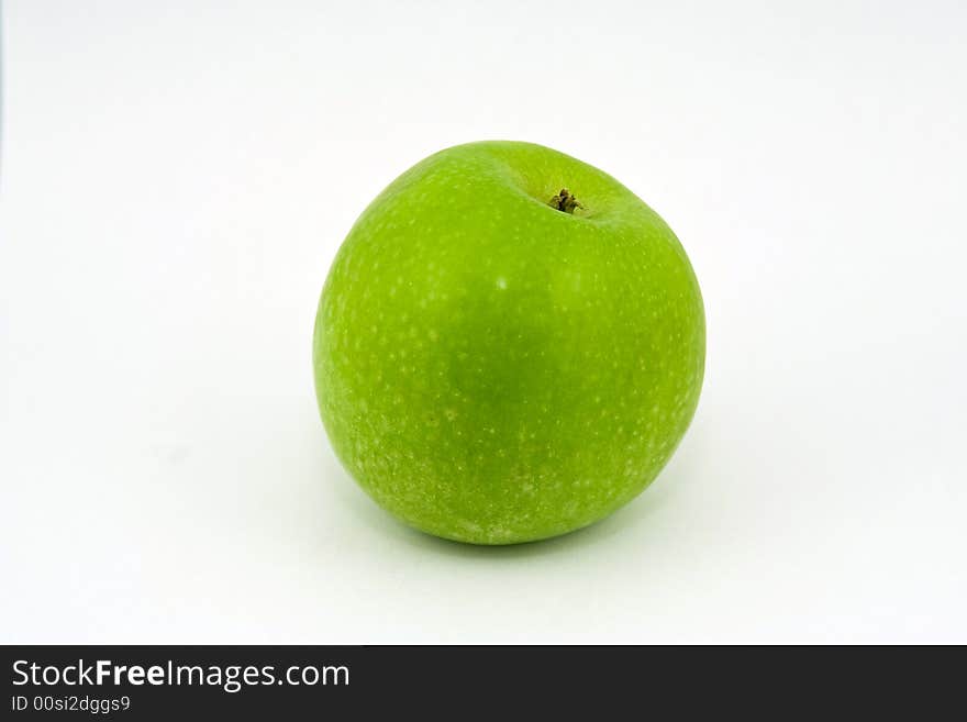 Green apple on a white background