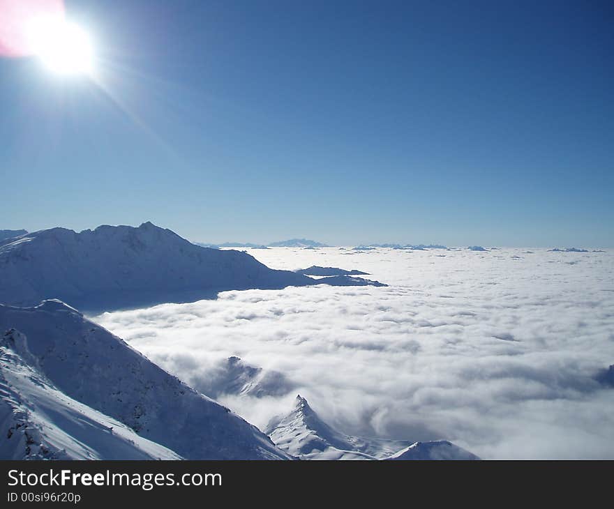 French Alps above the clouds in Les Arcs