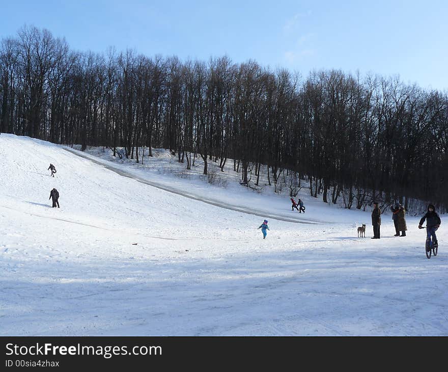 Icy mountain in abandoned winter park at noon. Icy mountain in abandoned winter park at noon