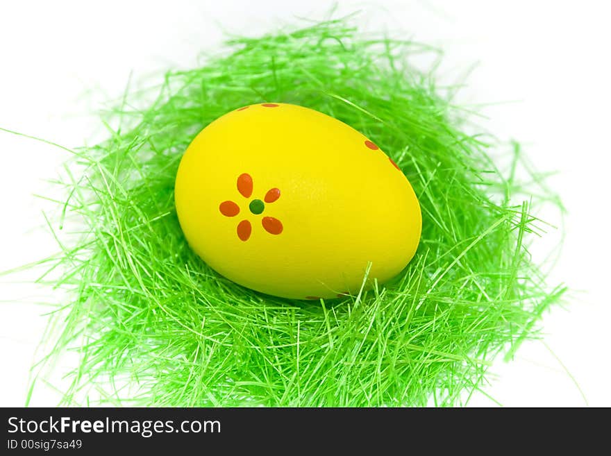 One Yellow Easter Egg With Green Grass