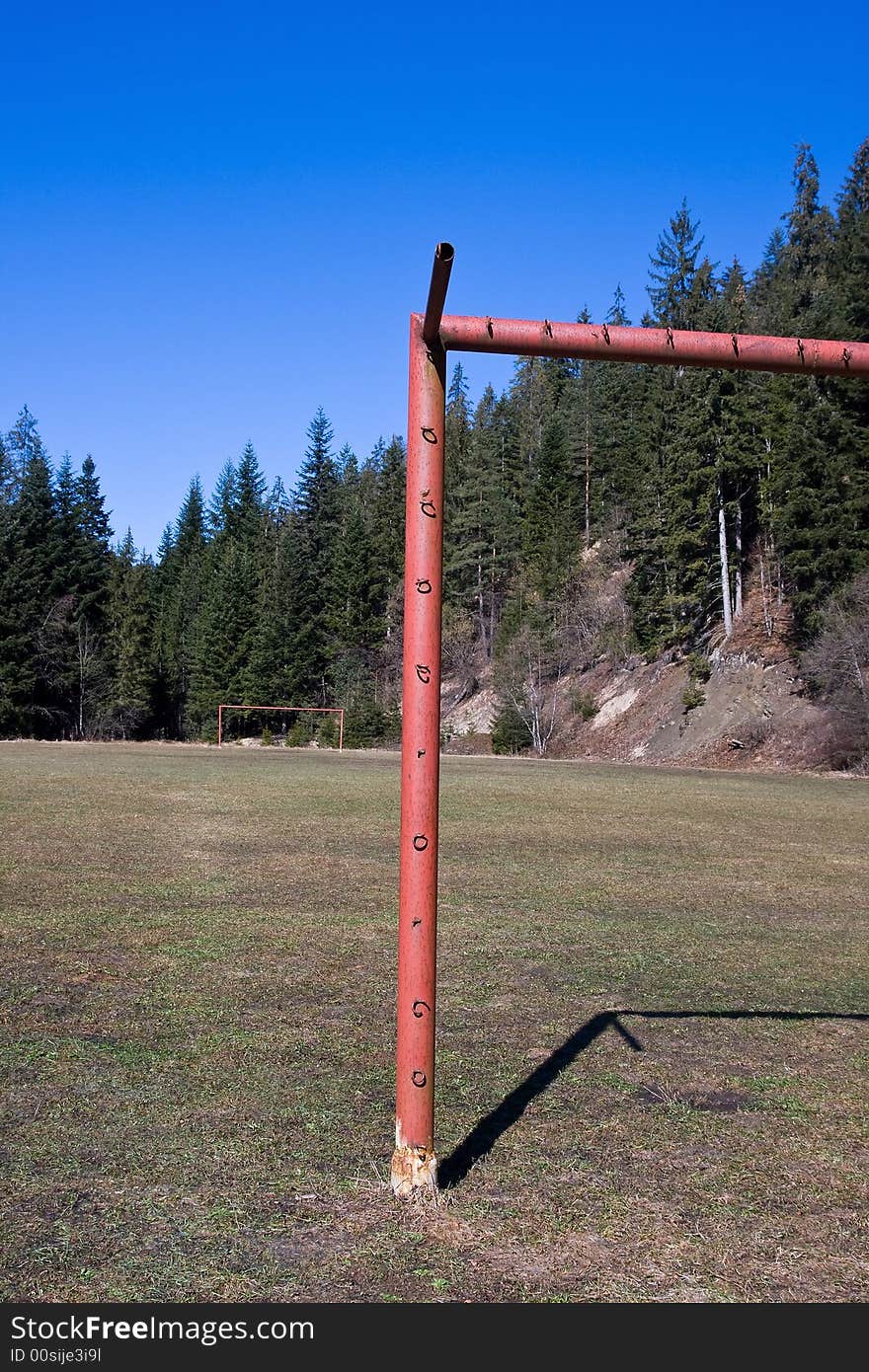 Empty soccer football field in the nature on the sunny day. Empty soccer football field in the nature on the sunny day