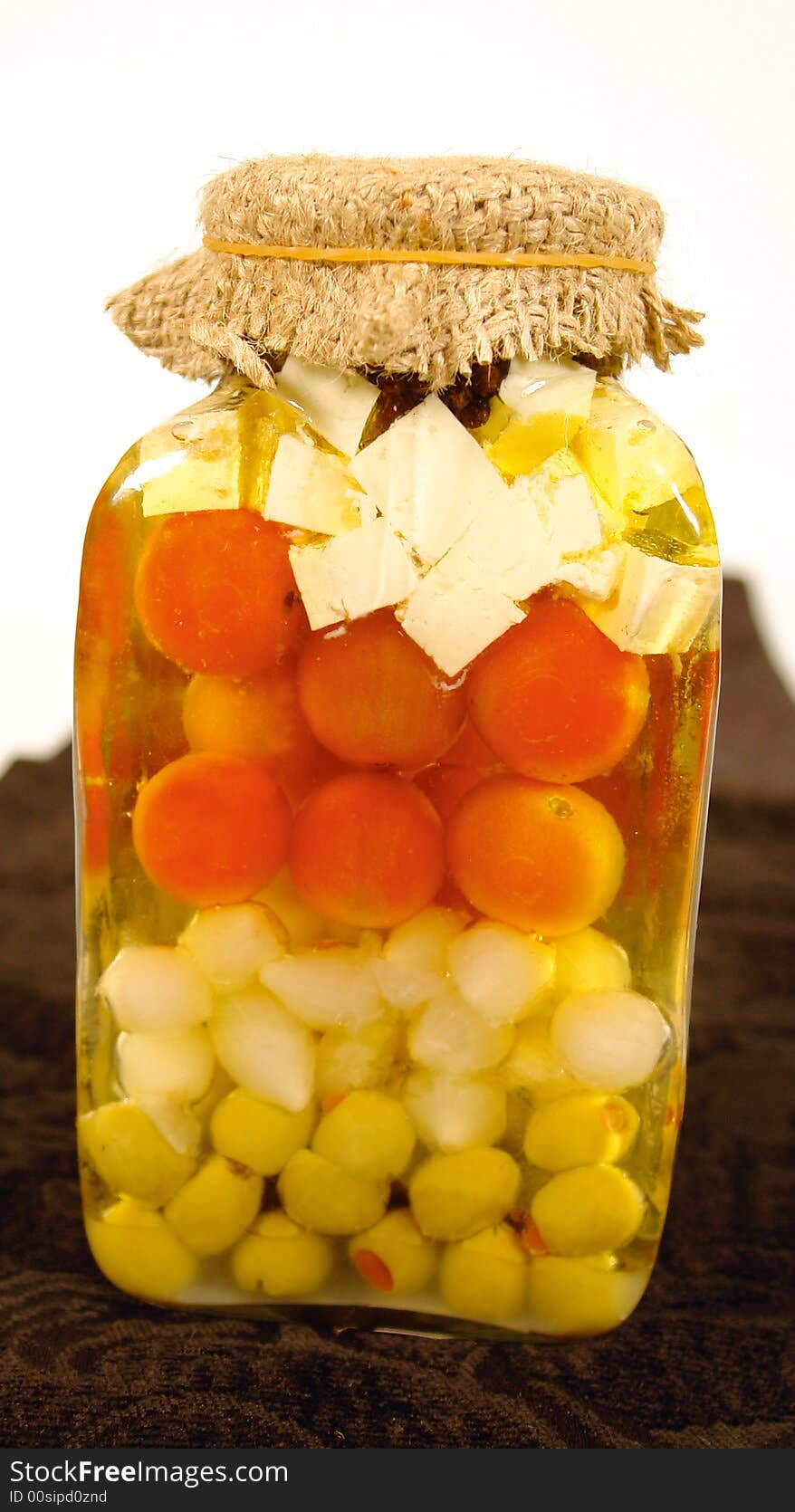 Preserved olives pearl onions and tomatoes with cheese cubes. Preserved olives pearl onions and tomatoes with cheese cubes