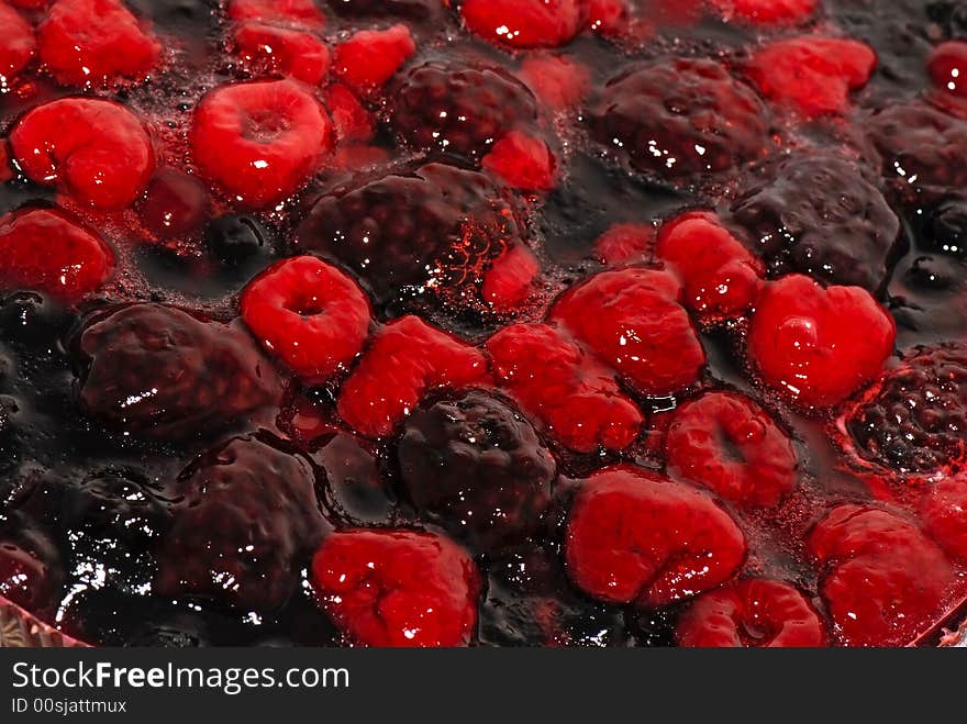 Some different berries in jelly. Some different berries in jelly