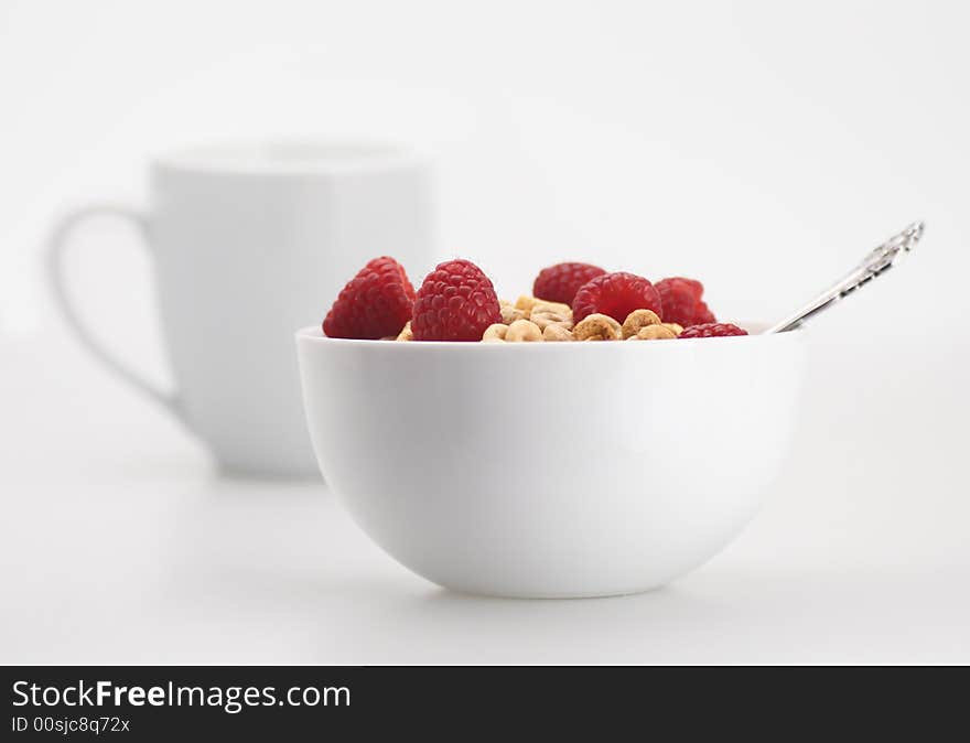 Cereal raspberry and milk for breakfast