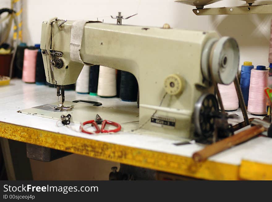 Old Sewing machine and the color thread.