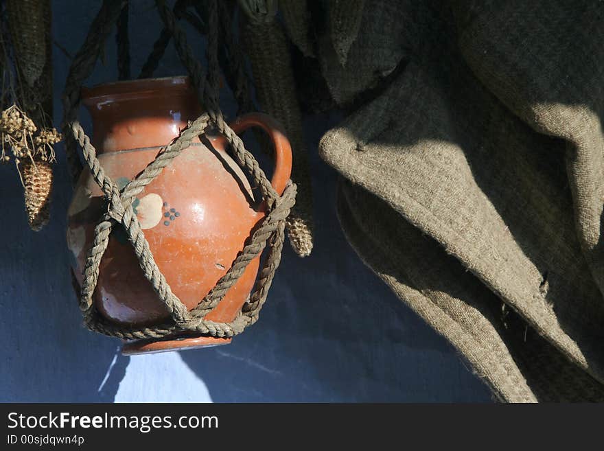 Clay pot with sac under the drip