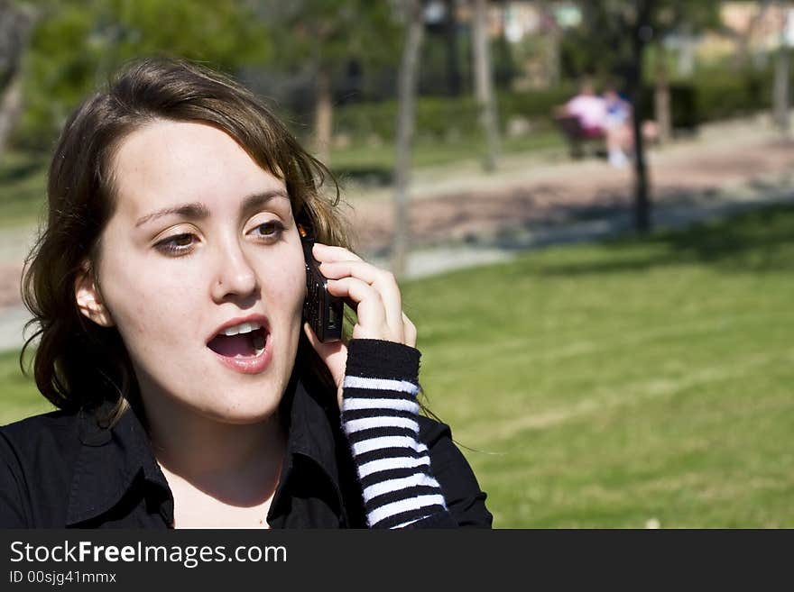 Surprised woman at phone