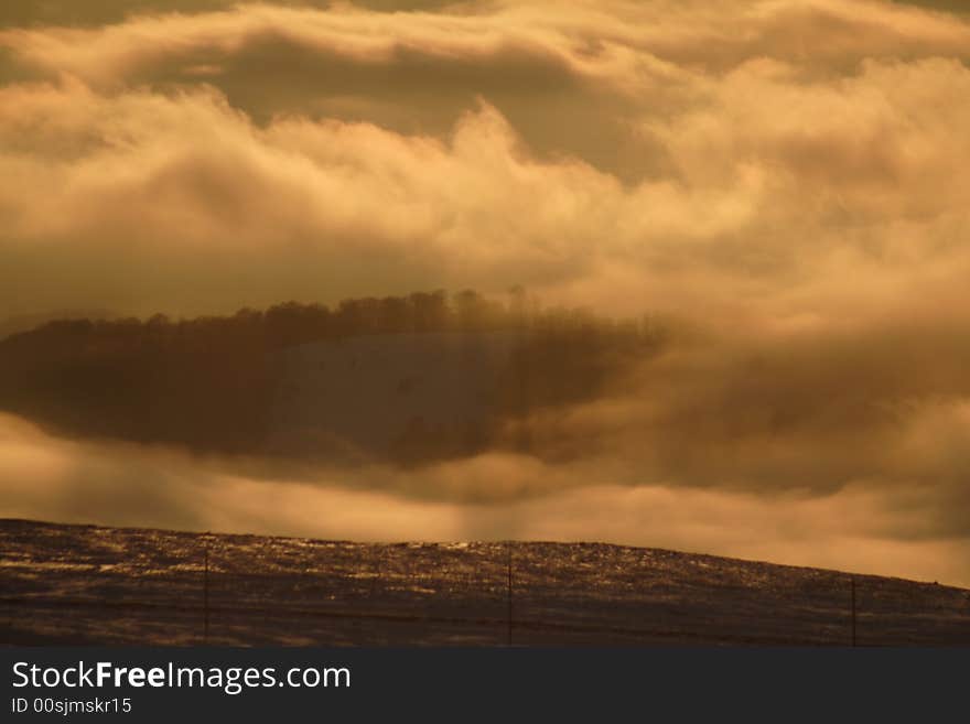 Cloudy sunset in the mountains in winter