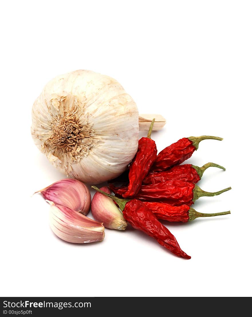 Garlic and chili pepper, a tipical seasoning for italian spaghetti. Garlic and chili pepper, a tipical seasoning for italian spaghetti