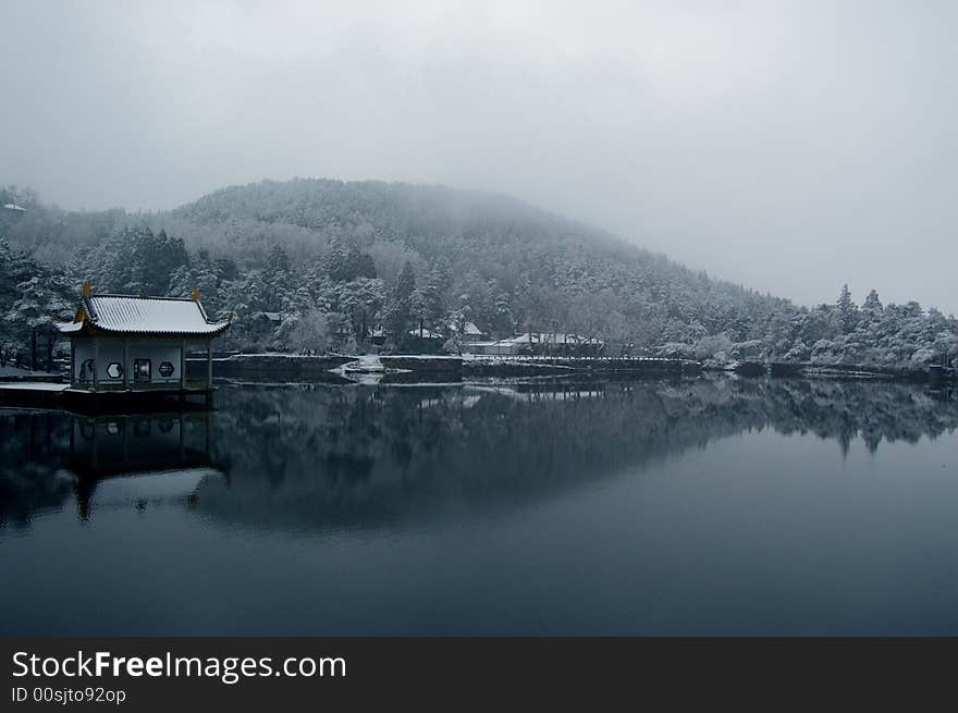 Summerhouse on the side of the lake in the foot od mountains. Summerhouse on the side of the lake in the foot od mountains