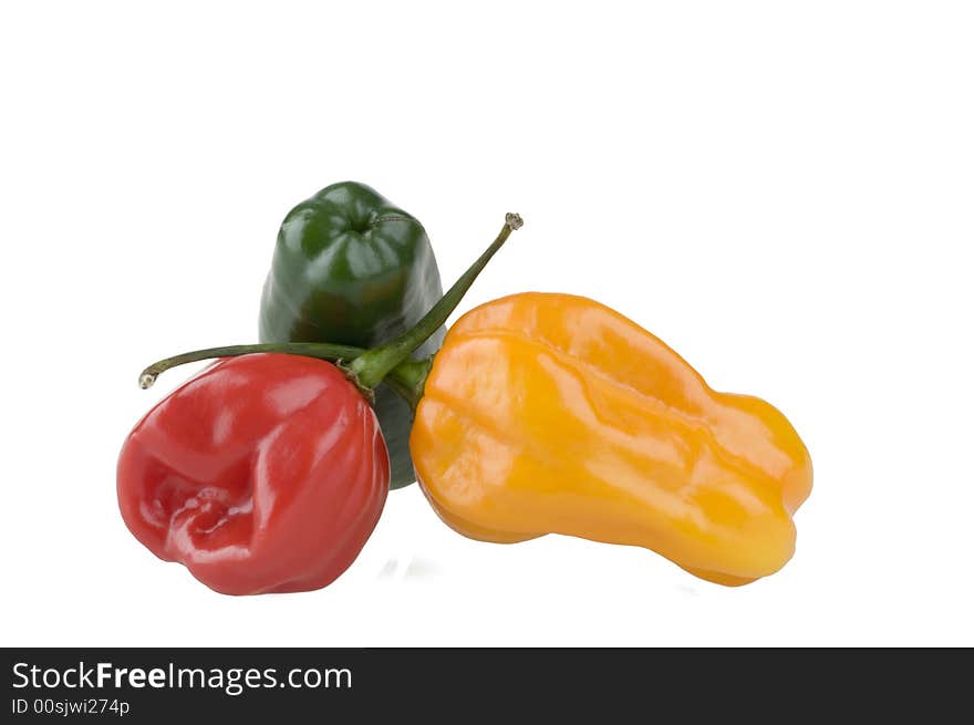 Color hot peppers isolated over white