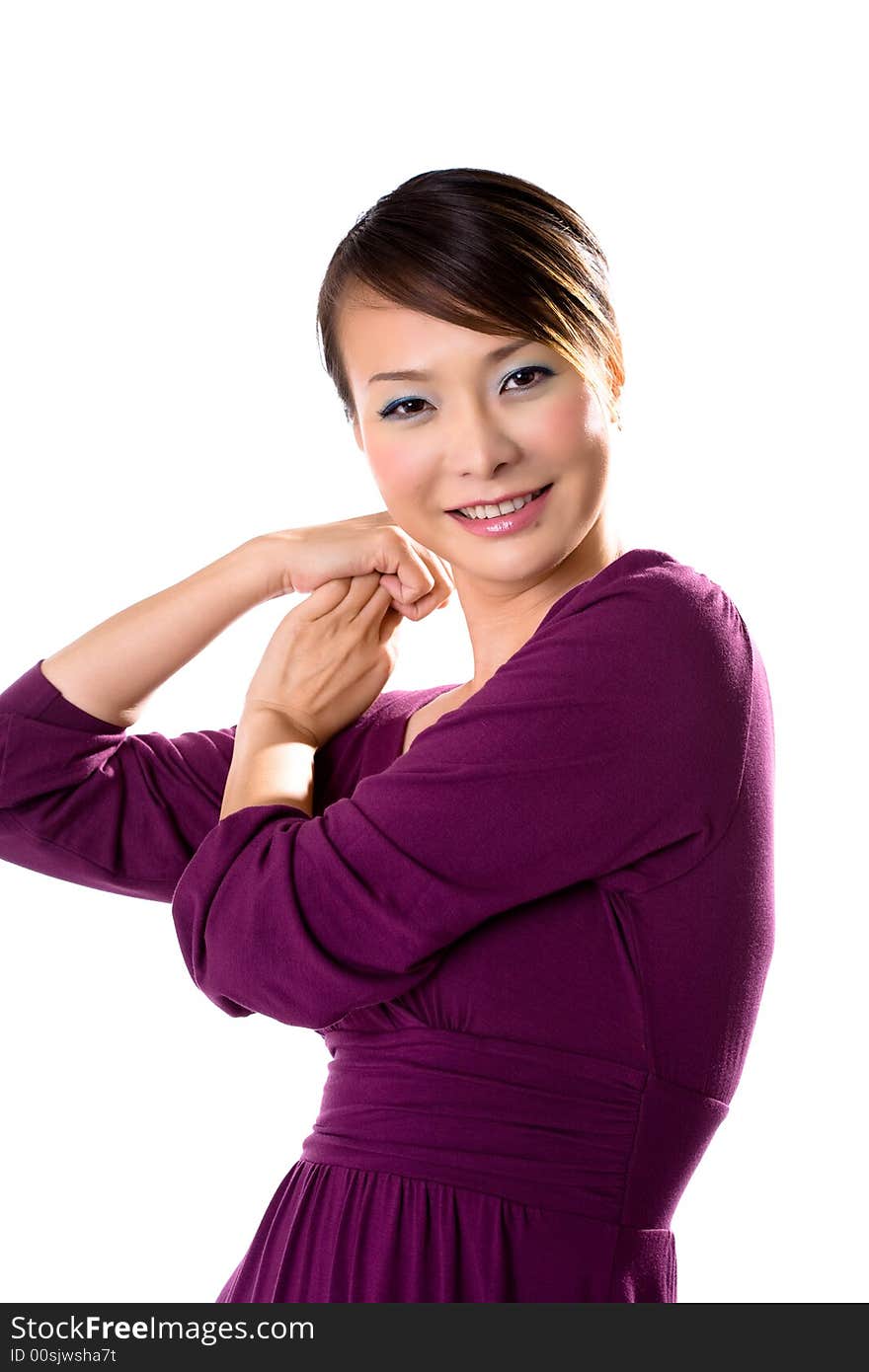 Beautiful asian woman in purple dress with a friendly smile. Beautiful asian woman in purple dress with a friendly smile